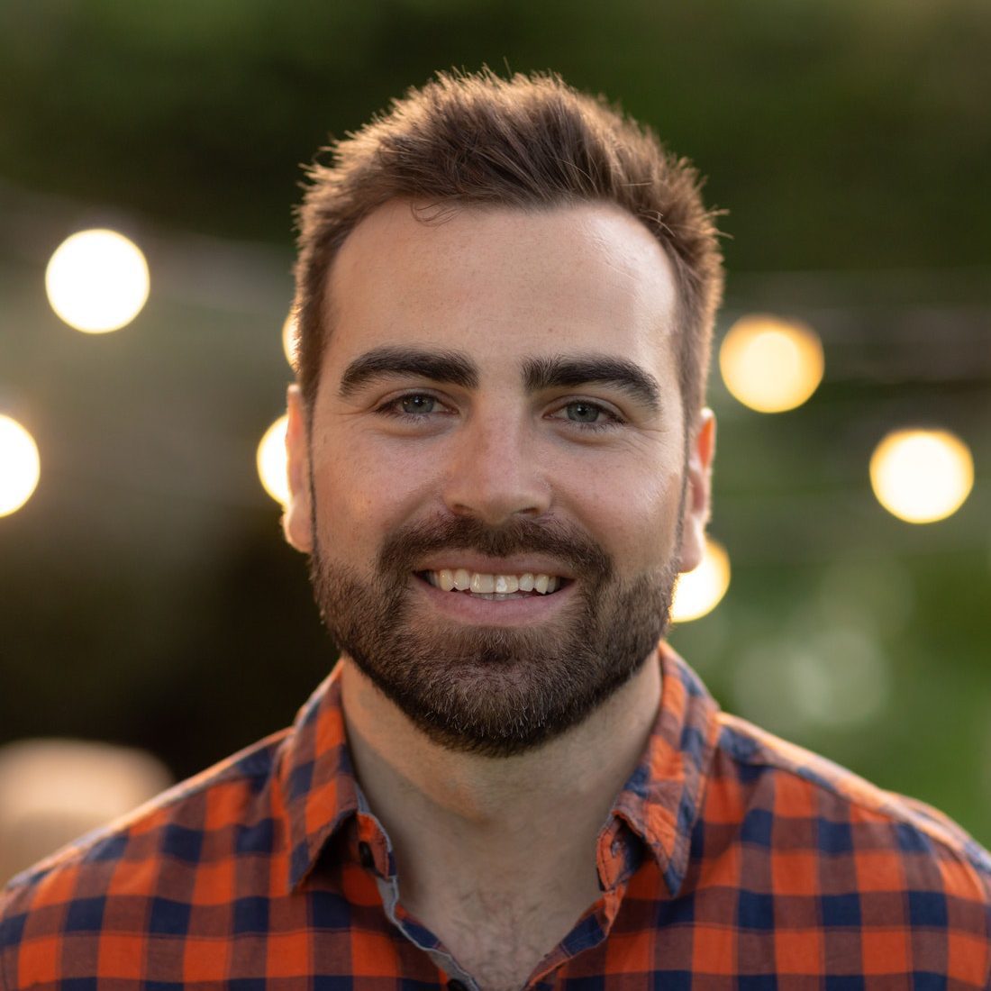 caucasian man smiling and looking at camera e1645260032992.jpg